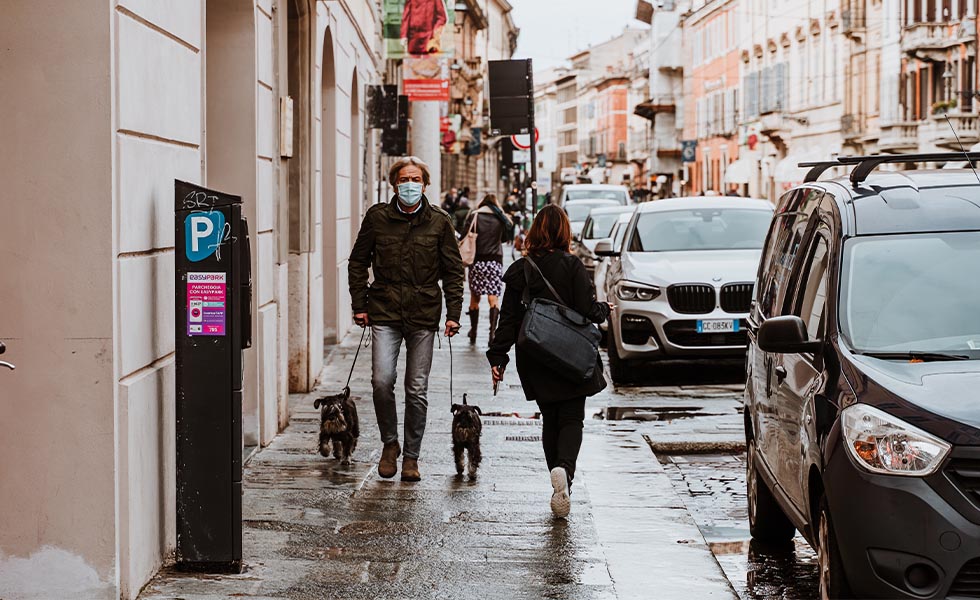 Parked cars and pedestrians